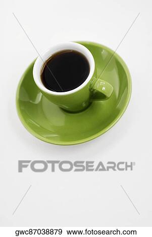 High angle view of a cup of black tea on a saucer View Large Photo Image Stock Photo - High angle view of a cup of black tea on a saucer. Fotosearch