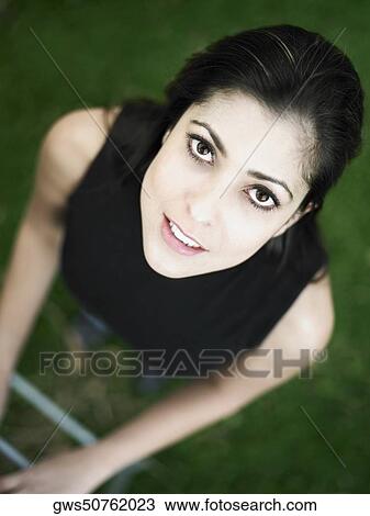 High angle view of a mid adult woman standing View Large Photo Image Stock Image - High angle view of a mid adult woman standing. Fotosearch