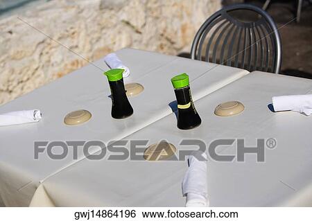 High angle view of a pepper shaker and napkins on the table View Large Photo Image Stock Photograph - High angle view of a pepper shaker and napkins on the table. Fotosearch