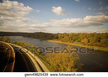 High angle view of a road along a river View Large Photo Image Stock Photo - High angle view of a road along a river. Fotosearch