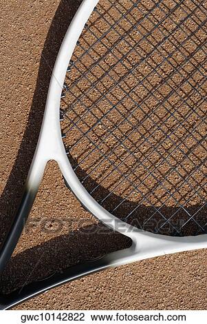 Stock Image - High angle view of a tennis racket. Fotosearch