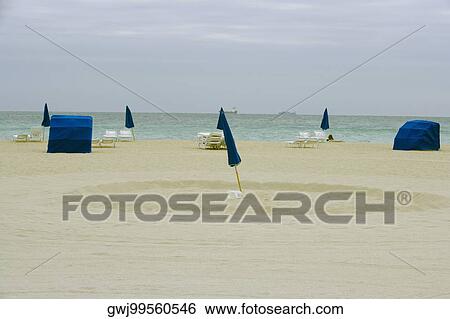 High angle view of beach chairs on the beach View Large Photo Image Stock Photograph - High angle view of beach chairs on the beach. Fotosearch