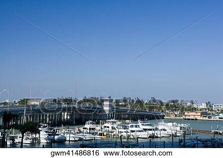 High angle view of boats moored at a dock View Large Photo Image Stock Photograph - High angle view of boats moored at a dock. Fotosearch