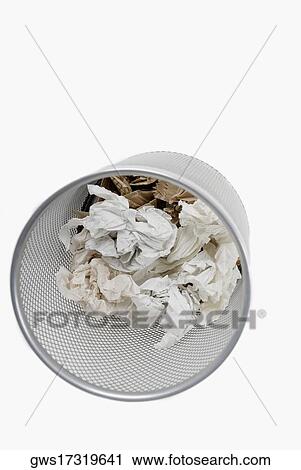 High angle view of crumpled paper in a wastepaper basket View Large Photo Image Stock Image - High angle view of crumpled paper in a wastepaper basket. Fotosearch