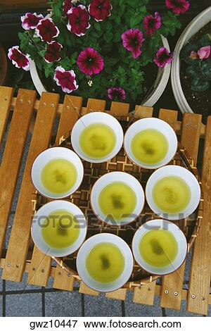 High angle view of cups of green tea on a tray, Hakone, Kanagawa Prefecture, Honshu, Japan View Large Photo Image Stock Photo - High angle view of cups of green tea on a tray, Hakone, Kanagawa Prefecture, Honshu, Japan. Fotosearch