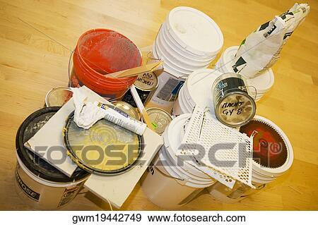 Stock Photo - High angle view of paint cans. Fotosearch