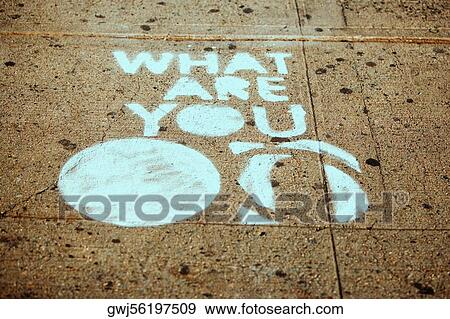 High angle view of text written on the floor View Large Photo Image Stock Photo - High angle view of text written on the floor. Fotosearch