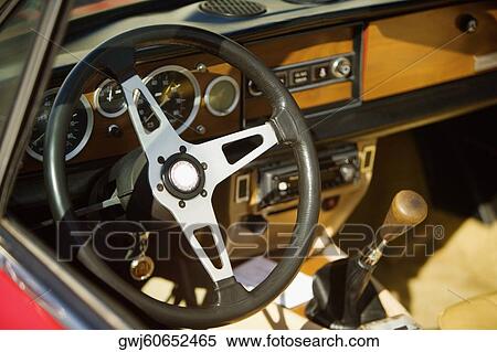 High angle view of the steering wheel of a car, Miami, Florida, USA View Large Photo Image Stock Photography - High angle view of the steering wheel of a car, Miami, Florida, USA. Fotosearch