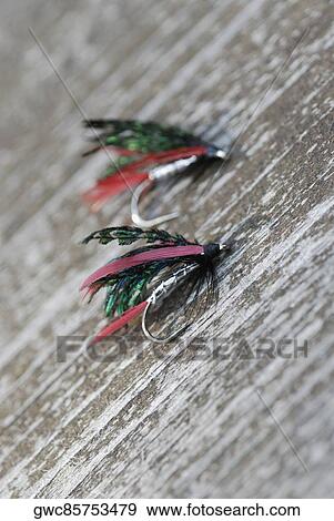 Stock Photo - High angle view of two fishing lures. Fotosearch