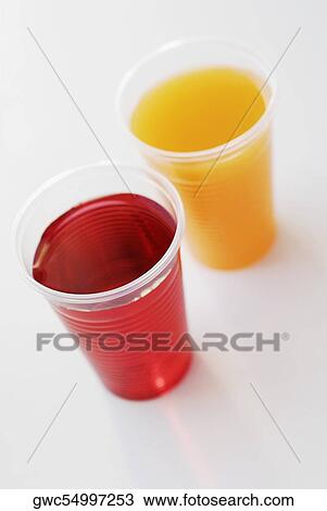 High angle view of two glasses of juice View Large Photo Image Stock Image - High angle view of two glasses of juice. Fotosearch
