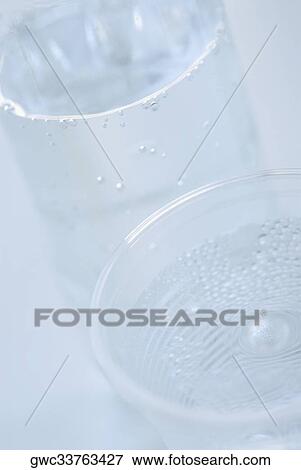 High angle view of two glasses of water View Large Photo Image Stock Photo - High angle view of two glasses of water. Fotosearch