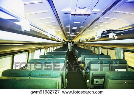 Stock Photo - Interiors of a commuter train. Fotosearch