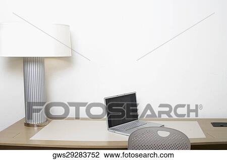 Laptop on the table View Large Photo Image Stock Image - Laptop on the table. Fotosearch