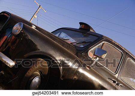 Low angle view of a car View Large Photo Image Stock Image - Low angle view of a car. Fotosearch
