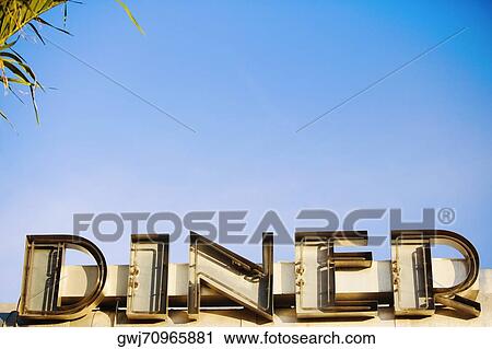 Low angle view of a commercial sign View Large Photo Image Stock Image - Low angle view of a commercial sign. Fotosearch