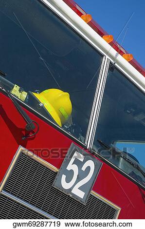 Low angle view of a fire engine View Large Photo Image Stock Photo - Low angle view of a fire engine. Fotosearch