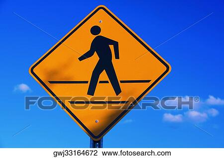Low angle view of a pedestrian crossing sign View Large Photo Image Stock Image - Low angle view of a pedestrian crossing sign. Fotosearch