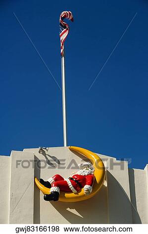 Low angle view of a sculpture on the wall of a building, Miami, Florida, USA View Large Photo Image Stock Photo - Low angle view of a sculpture on the wall of a building, Miami, Florida, USA. Fotosearch