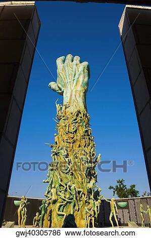 Low angle view of a sculptured human hand View Large Photo Image Stock Photograph - Low angle view of a sculptured human hand. Fotosearch