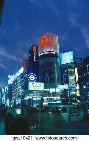 Low angle view of buildings lit up at night, Sanai Building, Ginza, Tokyo Prefecture, Japan View Large Photo Image Stock Image - Low angle view of buildings lit up at night, Sanai Building, Ginza, Tokyo Prefecture, Japan. Fotosearch