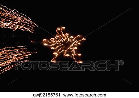 Low angle view of fire crackers exploding in the night sky View Large Photo Image Stock Image - Low angle view of fire crackers exploding in the night sky. Fotosearch
