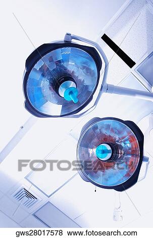Low angle view of surgical lamps View Large Photo Image Stock Photo - Low angle view of surgical lamps. Fotosearch