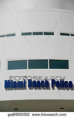 Stock Image - Low angle view of text on a building. Fotosearch