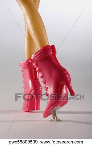 Stock Photo - Low section view of a doll. Fotosearch