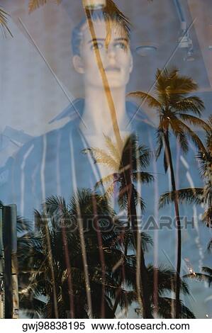 Stock Photography - Male mannequin behind a glass window. Fotosearch