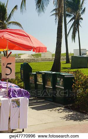 Market stall on a walkway View Large Photo Image Stock Photograph - Market stall on a walkway. Fotosearch