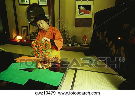 Mature woman making craft products from papers, Yunokuni-No-Mori, Komatsu, Ishikawa Prefecture, Japan View Large Photo Image Stock Photo - Mature woman making craft products from papers, Yunokuni-No-Mori, Komatsu, Ishikawa Prefecture, Japan. Fotosearch