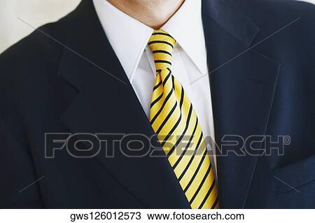 Stock Image - Mid section view of a businessman. Fotosearch