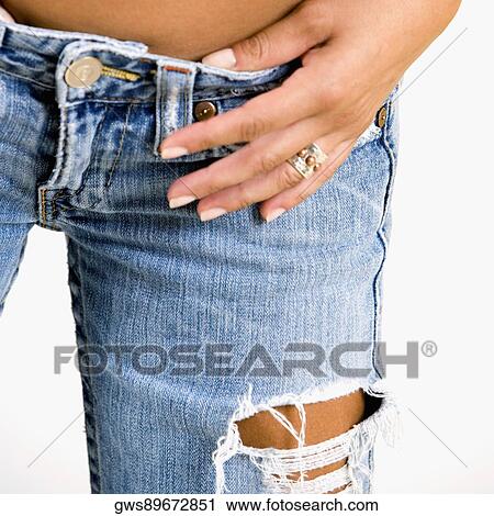 Mid section view of a woman View Large Photo Image Stock Image - Mid section view of a woman. Fotosearch