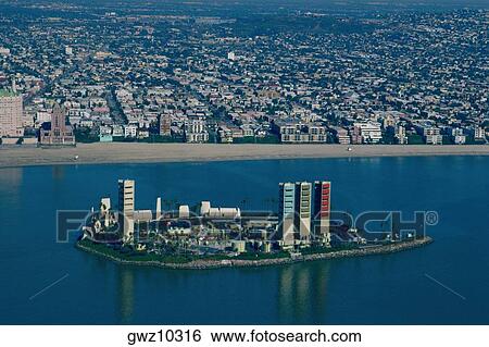 Offshore oil rigs disguised as highrises, Long Beach, California View Large Photo Image Stock Photograph - Offshore oil rigs disguised as highrises, Long Beach, California. Fotosearch
