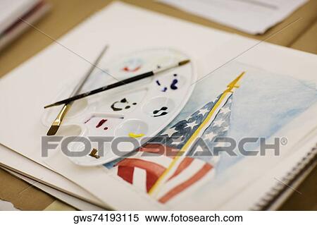 Paint brushes and a palette on an American flag painted on a sketch pad View Large Photo Image Stock Photography - Paint brushes and a palette on an American flag painted on a sketch pad. Fotosearch