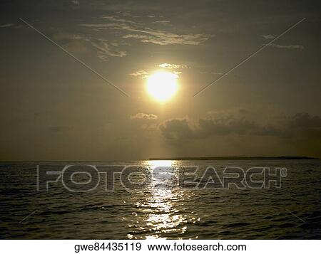 Panoramic view of the sea at dusk View Large Photo Image Stock Photo - Panoramic view of the sea at dusk. Fotosearch