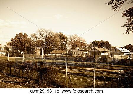 Park near buildings in a village View Large Photo Image Stock Photography - Park near buildings in a village. Fotosearch