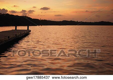 Pier in the sea View Large Photo Image Stock Photo - Pier in the sea. Fotosearch