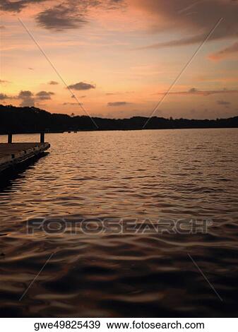 Pier in the sea View Large Photo Image Stock Photo - Pier in the sea. Fotosearch