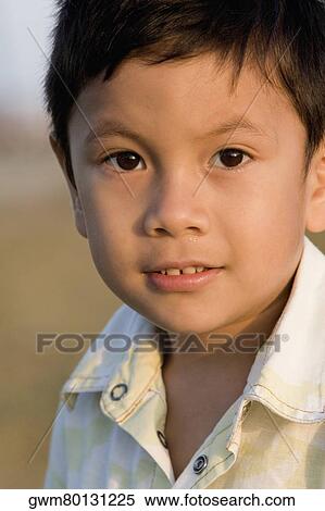 Portrait of a boy grinning View Large Photo Image Stock Photography - Portrait of a boy grinning. Fotosearch