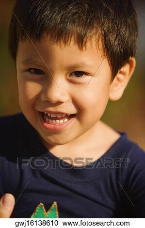 Portrait of a boy smiling View Large Photo Image Stock Image - Portrait of a boy smiling. Fotosearch