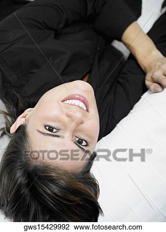 Portrait of a businesswoman smiling View Large Photo Image Stock Image - Portrait of a businesswoman smiling. Fotosearch