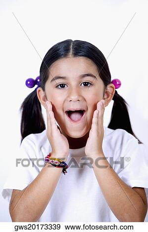 Portrait of a girl looking surprised View Large Photo Image Stock Photo - Portrait of a girl looking surprised. Fotosearch