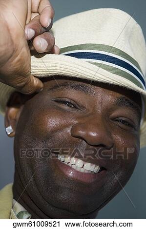 Portrait of a mature man smiling View Large Photo Image Stock Image - Portrait of a mature man smiling. Fotosearch
