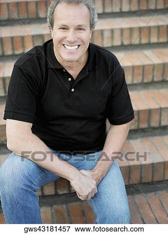 Stock Photo - Portrait of a mature man smiling. Fotosearch