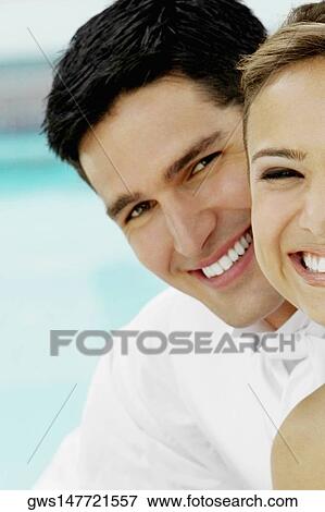 Portrait of a mid adult couple smiling View Large Photo Image Stock Photo - Portrait of a mid adult couple smiling. Fotosearch