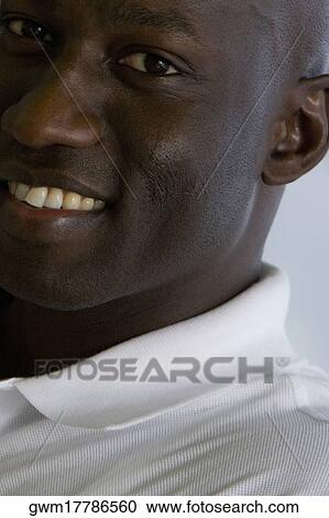 Portrait of a mid adult man smiling View Large Photo Image Stock Image - Portrait of a mid adult man smiling. Fotosearch