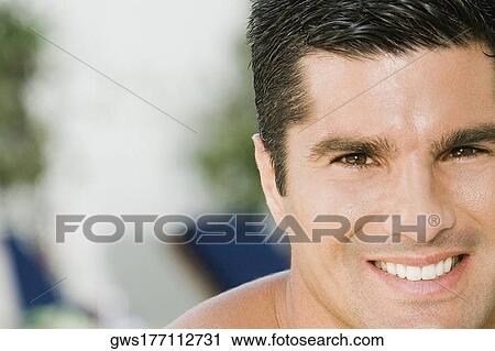 Portrait of a mid adult man smiling View Large Photo Image Stock Image - Portrait of a mid adult man smiling. Fotosearch