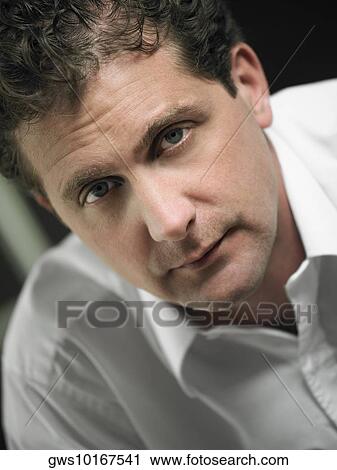 Stock Image - Portrait of a mid adult man. Fotosearch