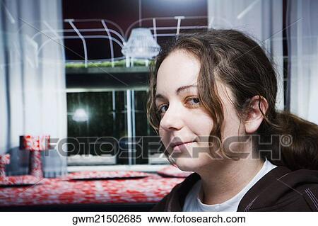 Portrait of a mid adult woman in a bedroom View Large Photo Image Stock Photography - Portrait of a mid adult woman in a bedroom. Fotosearch